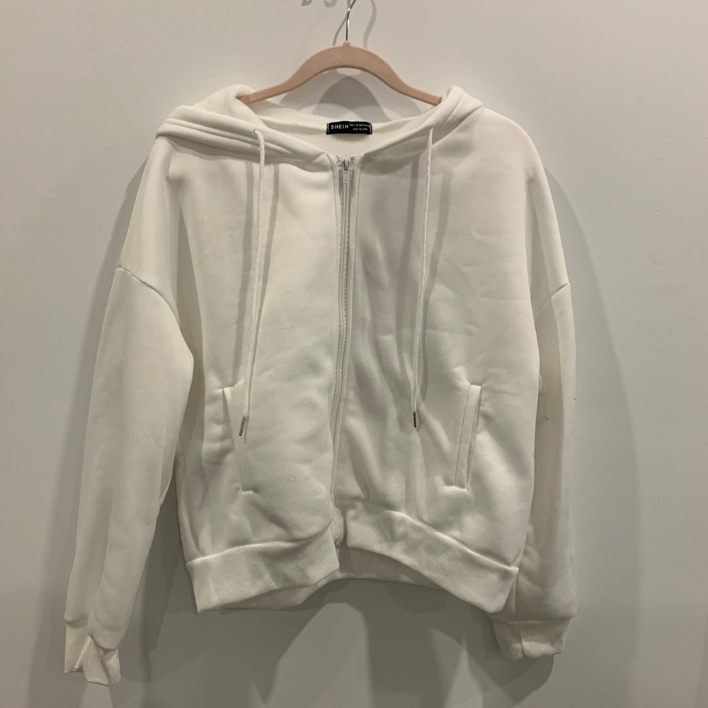 white soft zip up sweater